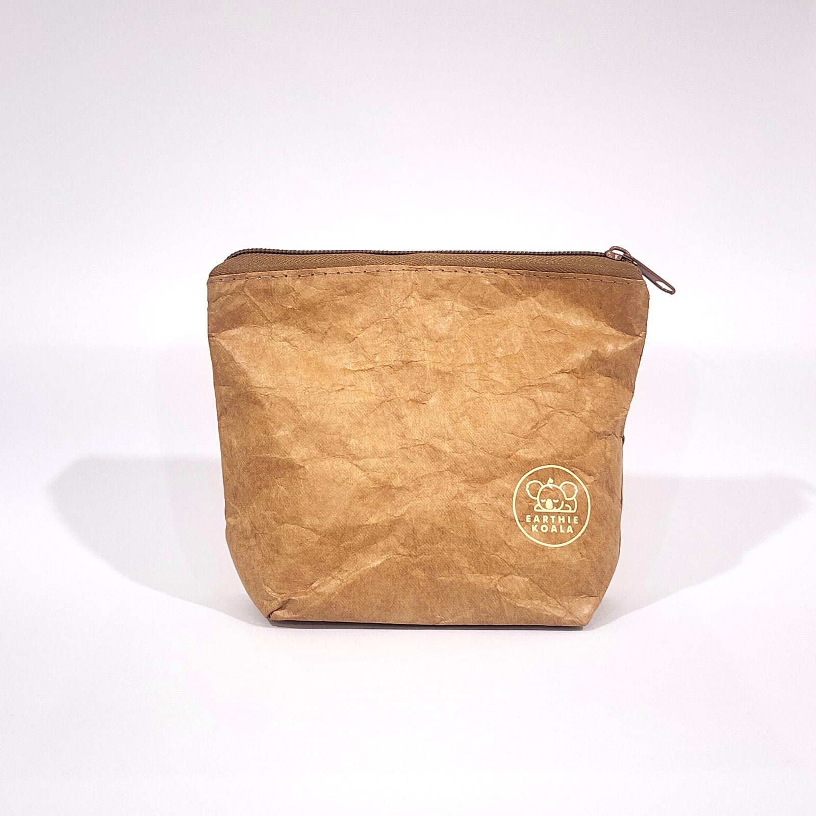 Mum and Bub Minis Set with Body Butter, Baby Balm, Mum Oil, and Lip & Nipple Balm on a stone surface with blurred dried grass, organic skincare for mum and baby